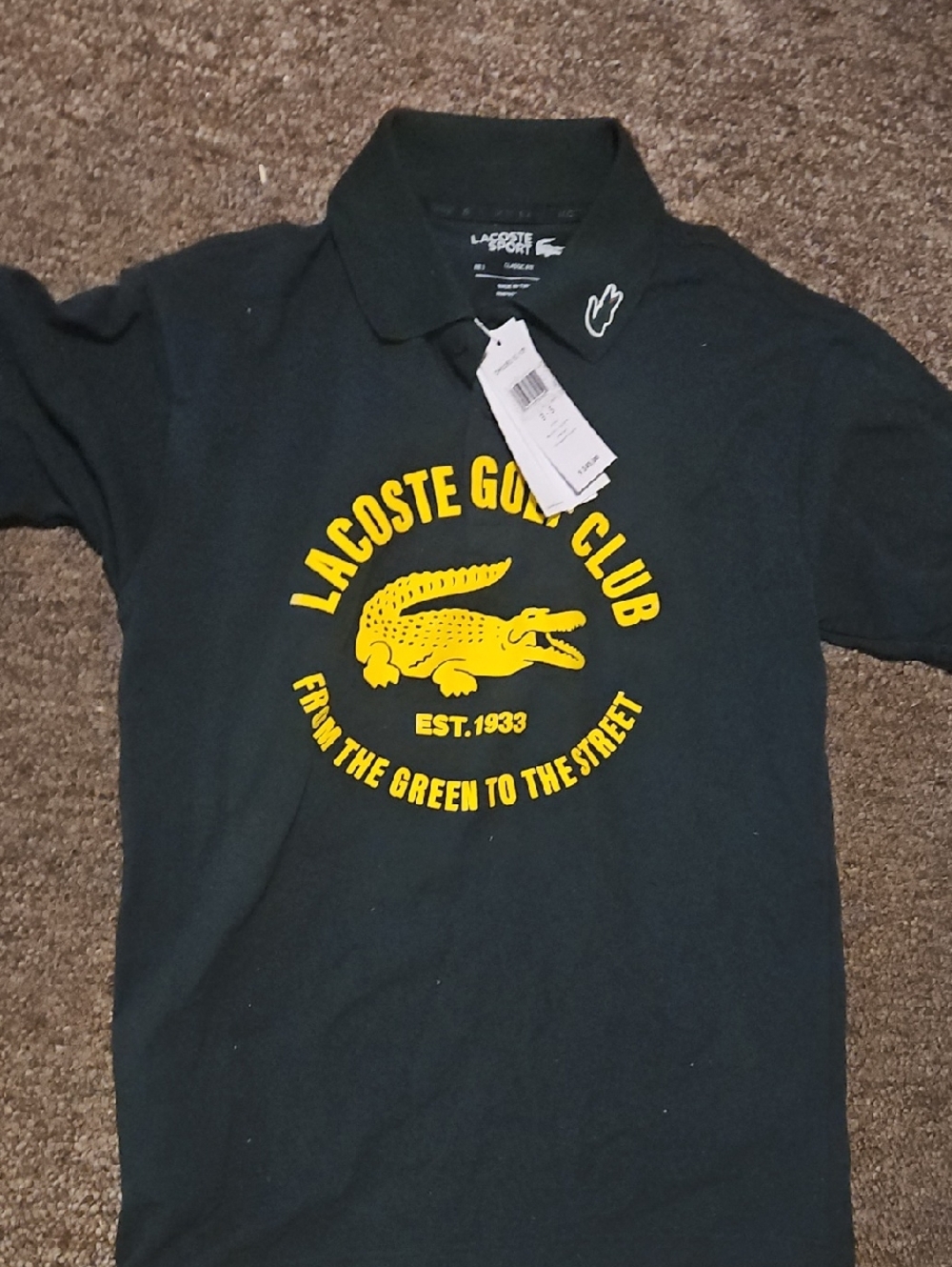 Lacoste  Dark Green Polo with Yellow Golf Club Graphic